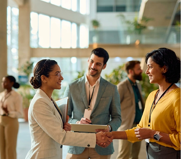 Professionals networking at a PESSA event
